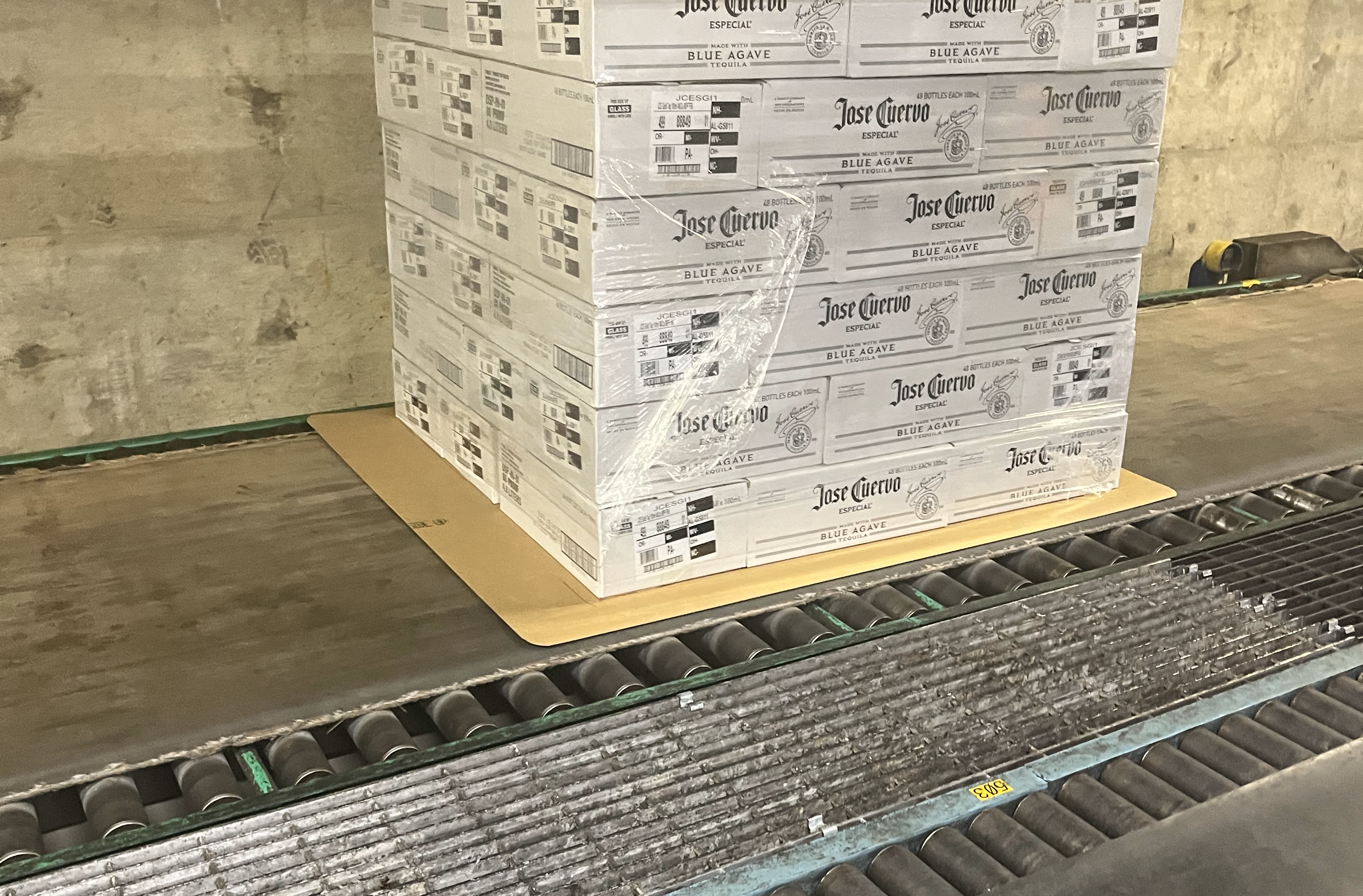 pushpullonconveyor slip sheets are a popular choice to replace traditional pallets